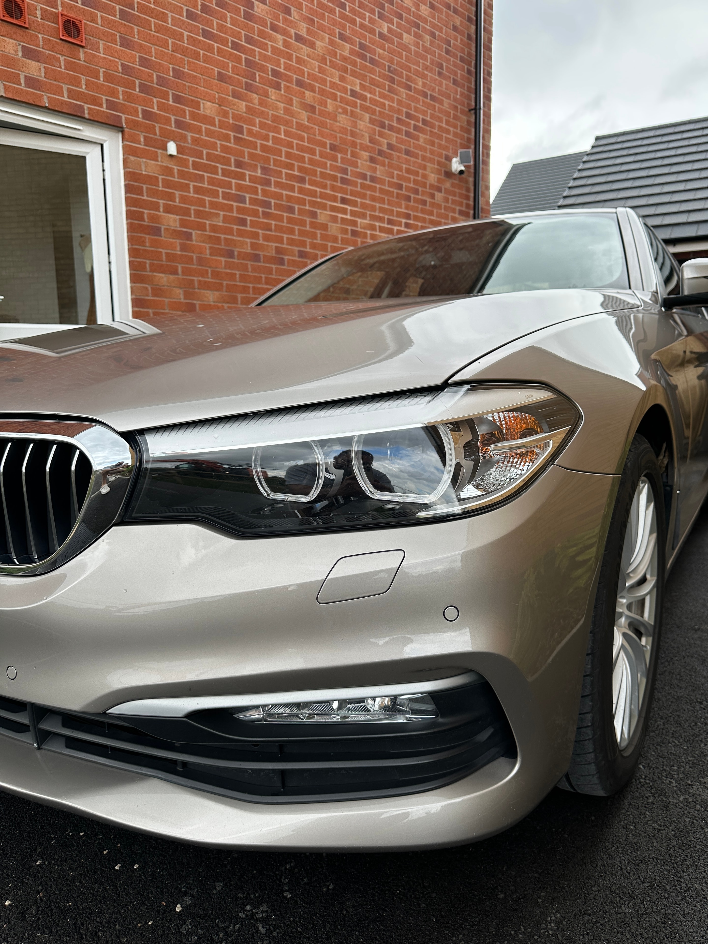 BMW front end with gleaming paintwork after professional detailing